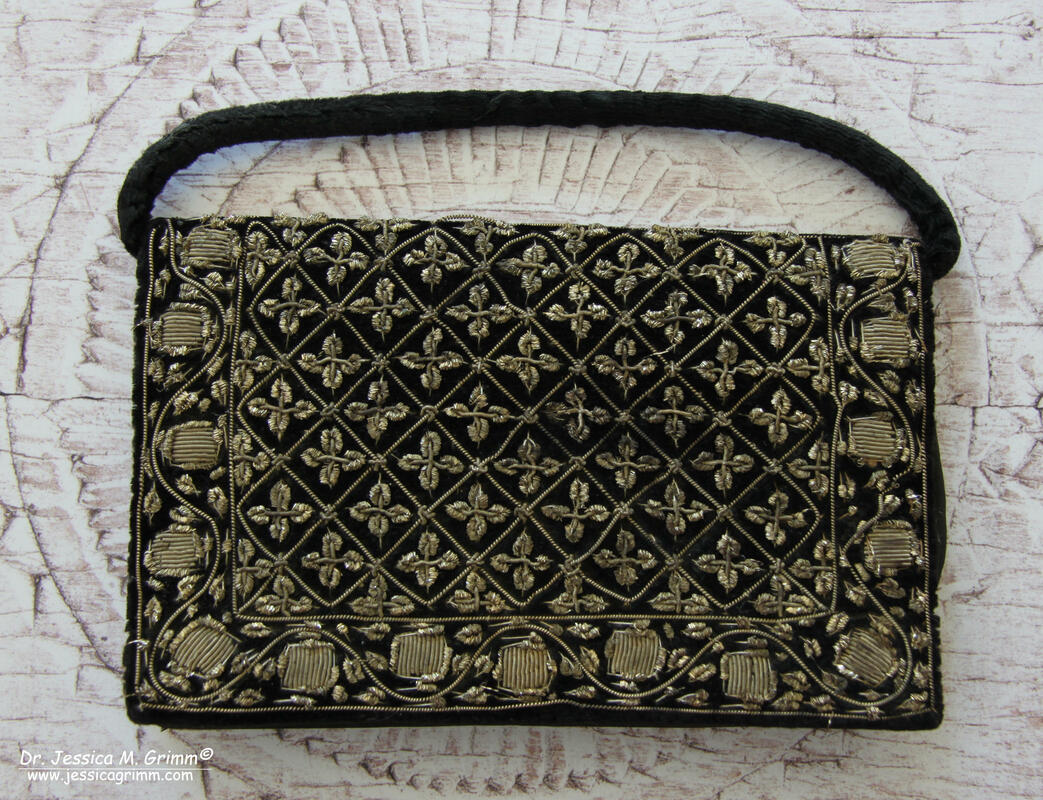 Little black clutch with goldwork embroidery