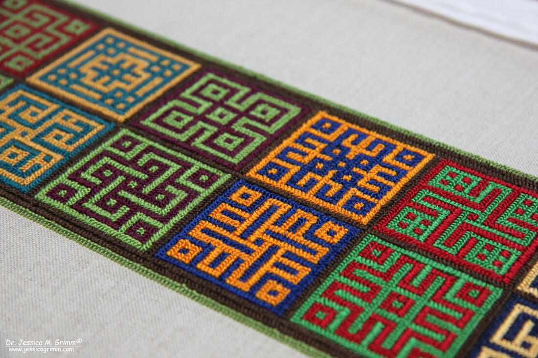 Long-armed cross stitch embroidery